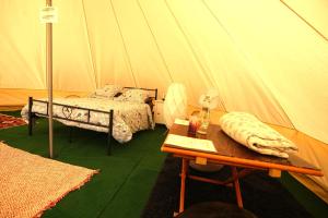 Tentes de luxe Camping Arbre de Vie : photos des chambres