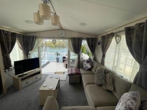 Lakeside Retreat 4 with hot tub, private fishing peg situated at Tattershall Lakes Country Park