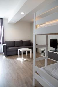 Appartements Le Petit Bernieres : photos des chambres