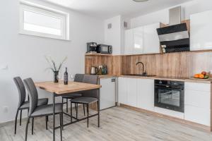 Apartamenty PIAMOLA Bursztynowa Kąty Rybackie