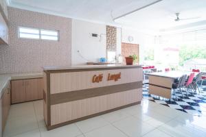 RedDoorz Syariah Near Lapangan Dwiwarna Barabai