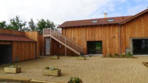 Maisons de vacances Gite dans un parc animalier avec piscine salle de cinema et petit dejeuner : photos des chambres