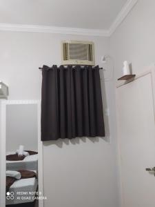 Pousada Quarto com ventilador,ar frigobar e garagem