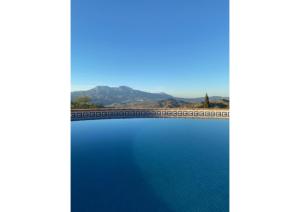 Sunny hillside casita in Guaro