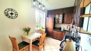 Apartament z ogrodem i grillem