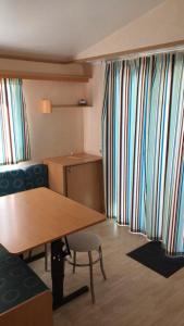 Campings Camping Le Bois De Pins : photos des chambres