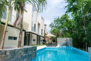 Estudio en Puerto Aventuras, Condominio con Alberca # 202