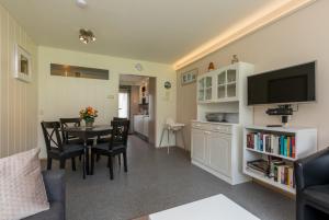 Welcome in - Appartement dichtbij het strand, met fietsenberging en ruim terras