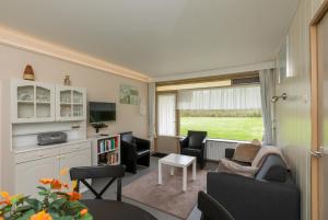 Welcome in - Appartement dichtbij het strand, met fietsenberging en ruim terras