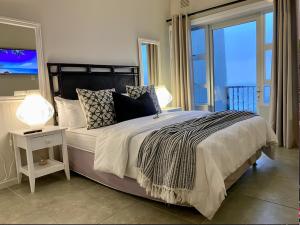 Beach front, two story condo