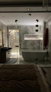 Luxury Furnished Duplex Apartment with a Private Garden