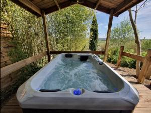 Appartements Adorable chalet avec jacuzzi privatif : photos des chambres