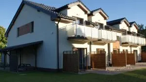 Apartamenty Domki Pokoje WeMa Wicie - Віцє