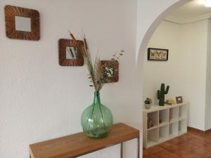 Apartment with pool and gardens near the coast