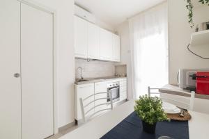 GuestHost - Piazza Tripoli Bright Apartments