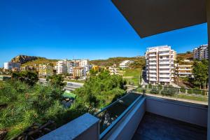 Quadruple Room with Balcony and Side Sea View room in Hotel Bella Vista