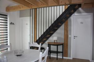 Appartement Duplex Au Chatrme des Blanches Pierres