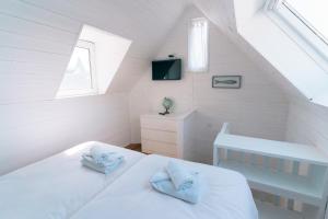 Fishermens House In The Center And Near The Beach