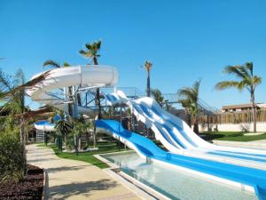 Maisons de vacances Maison avec piscine chauffee de Paques a la toussaint TAMARIS acces animation & parc aquatique DE juin a fin septembre : photos des chambres