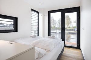 Welcome in - Houseboat de Valreep met tuin - Sneek - Offingawier