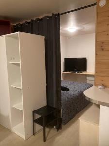 Appartements EXIGEHOME-Grand Studio en plein centre de Saint Germain en Laye : photos des chambres