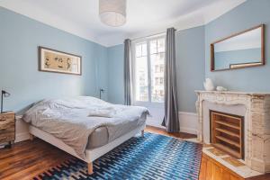 Villas MOULINS - Maison cosy au coeur de Reims : photos des chambres