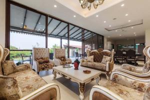 Casa del Verde by StayVista - Orchards oasis with a pool, Spacious lawn, Terrace & Indoor games