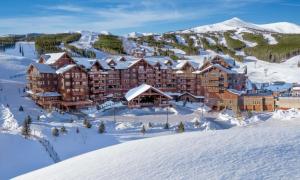 Expansive 4 Bedroom Ski In, Ski Out One Ski Hill Residence Located At The Base Of Peak 8 With Beautiful Views