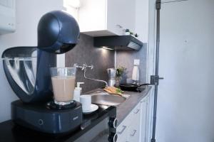 Appartements Studio Le cafe gourmand - Proche Gare - Coin tranquille : photos des chambres