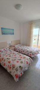 Apartamento céntrico en la playa con piscina.