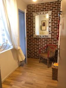 Appartements Le Petit Morny : photos des chambres