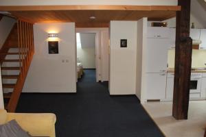 Three-Bedroom Apartment with Terrace room in Appartements im Forsthaus