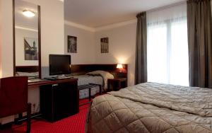 Hotels Hostellerie St Vincent : Chambre Triple