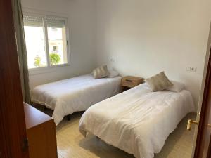 Casa a L’Escala, piscina comunitaria, Mallols