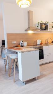 Appartements Artpink - Ideal Pros - Proche commerces - Agathor : photos des chambres