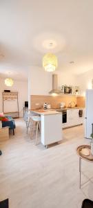 Appartements Artpink - Ideal Pros - Proche commerces - Agathor : photos des chambres