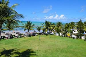 O paraíso em um flat à beira-mar de Carneiros