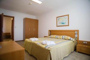 Two-Bedroom Apartment with Balcony (3 Adults + 1 Child) room in Emerald Beach Resort & Spa