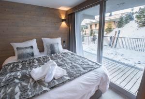 Luxueux appartement skis aux pieds, jacuzzi privatif