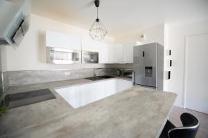 Appartements de 2 ou 3 chambres a 40 minutes de Paris : photos des chambres