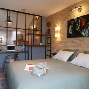 Appartements In Sarlat Luxury Rentals, Medieval Center - Loft Stella Matutina -2p-ascenseur-climatisation : photos des chambres