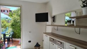 Appartamento in villa con veranda privata e parcheggio gratuito