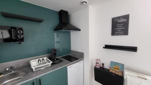 Appartements Studio Cosy proche Gare et Centre Ville : photos des chambres