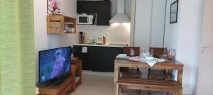 Appartements Les Terrasses du Lac piscine M65 : photos des chambres