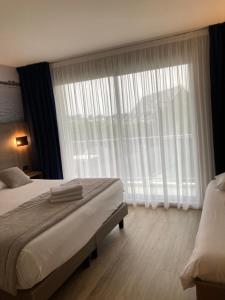 Hotels Hotel Europa : Chambre Triple Familiale - Vue sur Jardin (2 Adultes + 1 Enfant) 