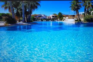 Maisons de vacances T3 60 m2 SUR SITE AVEC PISCINES ET MER A 200 M : photos des chambres