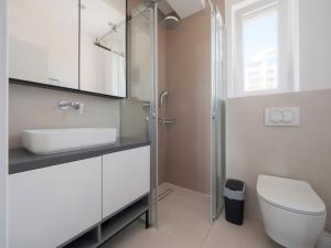 Modern Two Bedroom Apartment with Partial Sea View, Pool and Parking