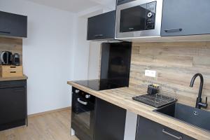 Appartements #Sweet Dreams By Nogar'Homes - WiFi-Netflix-Climatisation : photos des chambres