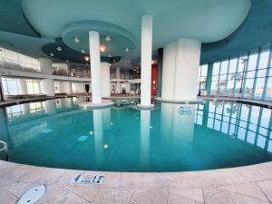 Turquoise Place 1005C ~ Luxurious Beachfront Condo w Private Hot Tub!