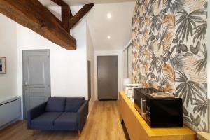 Appartements L'IDYLLE - Studio Cocooning avec Jacuzzi : photos des chambres